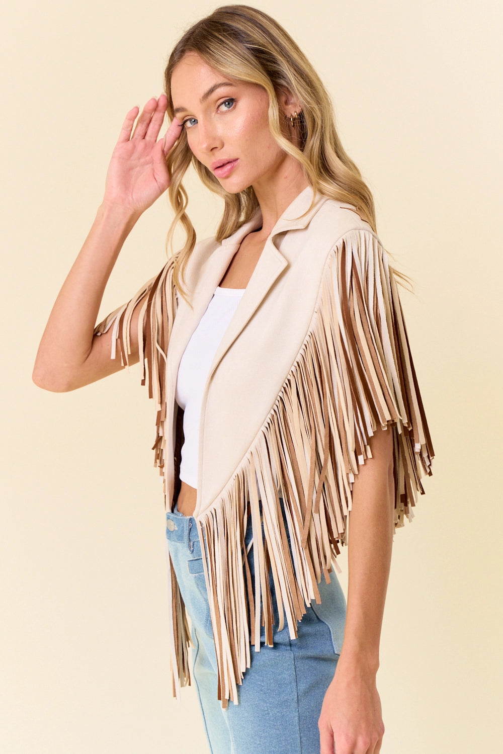 Cream fringe shrug with star motif