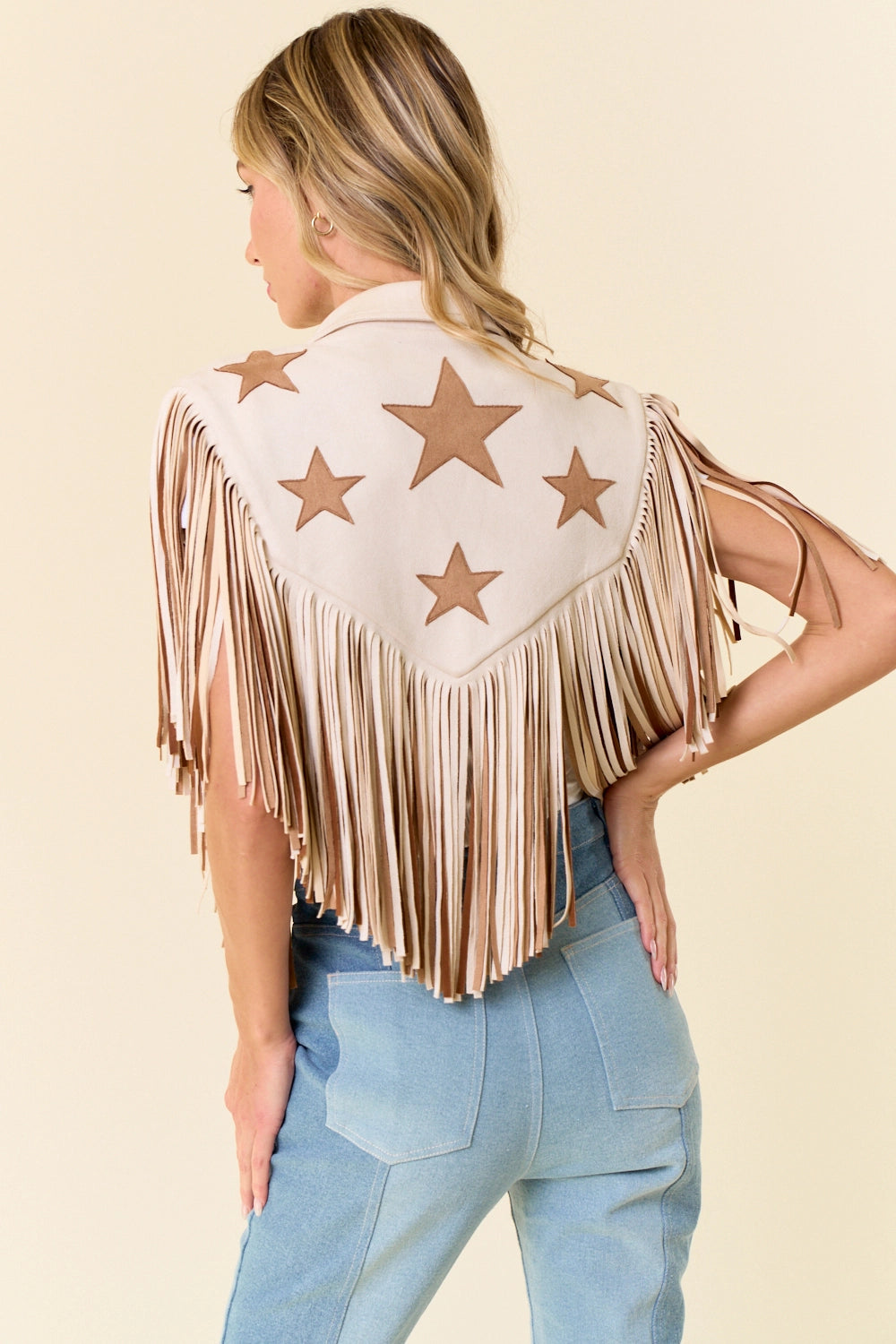 High quality star and tassel motif shrug in cream