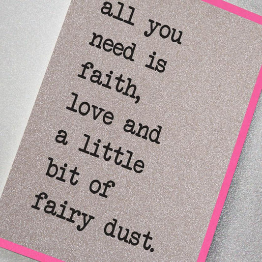 silver glitter effect greeting card featuring the slogan: All you need is faith, love and a little bit of fairy dust.