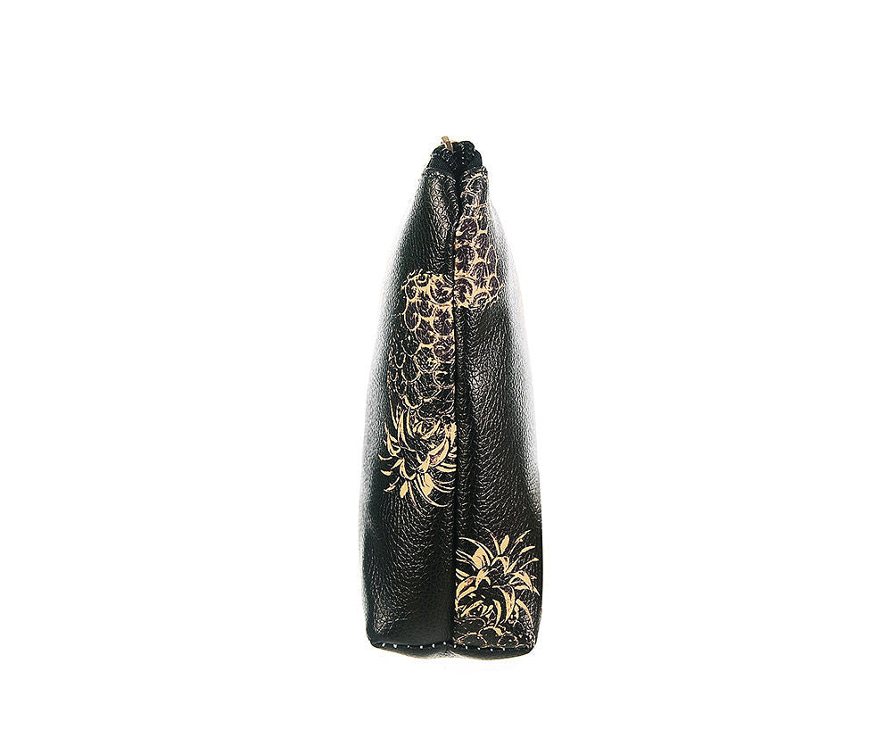 Side view of Gorgeous golden pineapple make up back perfect for any occasion in a roomy versatile size.