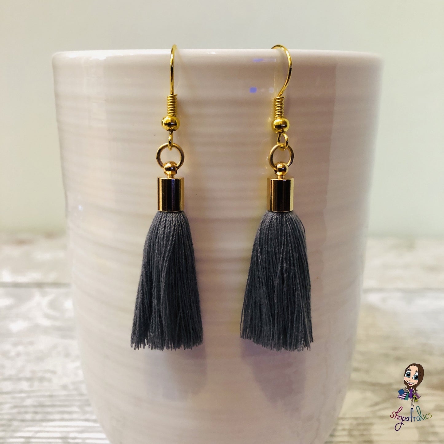 Grey Cotton Tassel Earring with gold plated ear hooks, and findings.