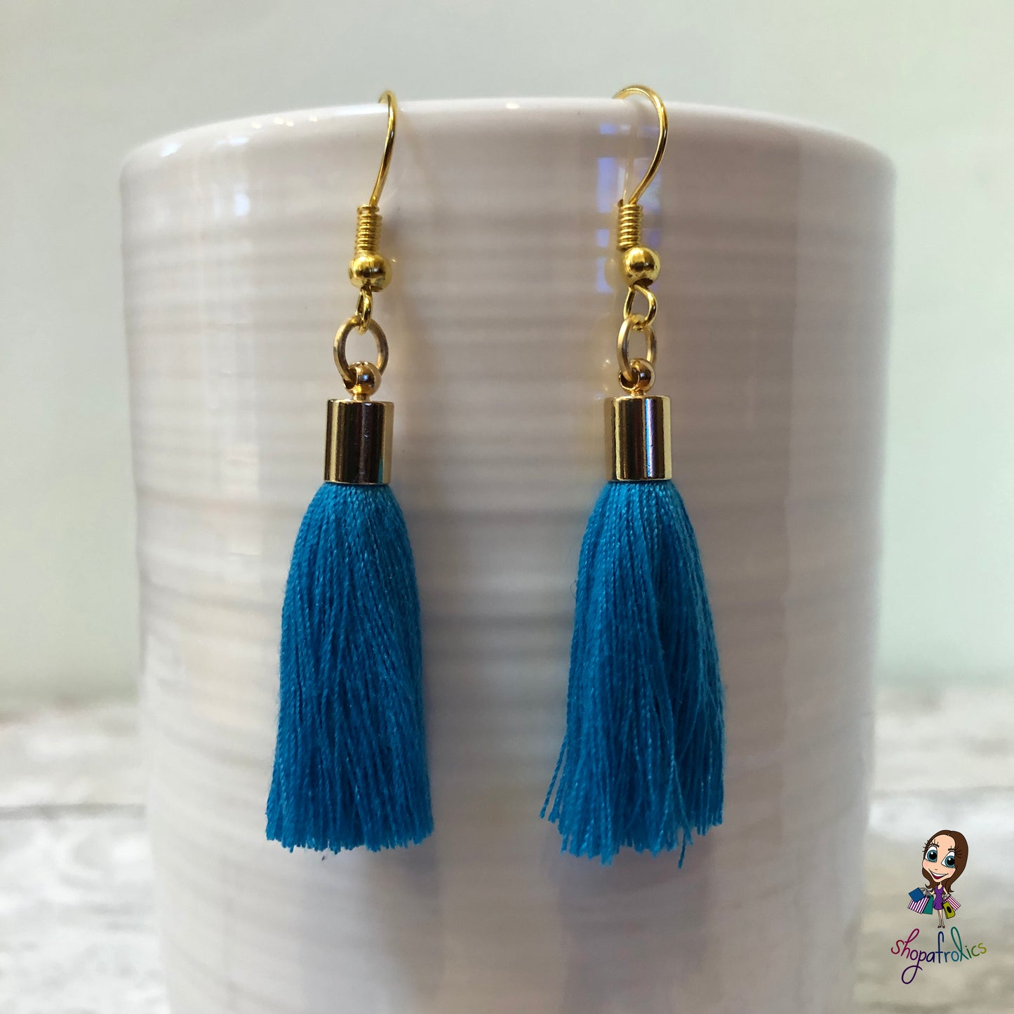 Blue Cotton Tassel Earring with gold plated ear hooks, and findings.