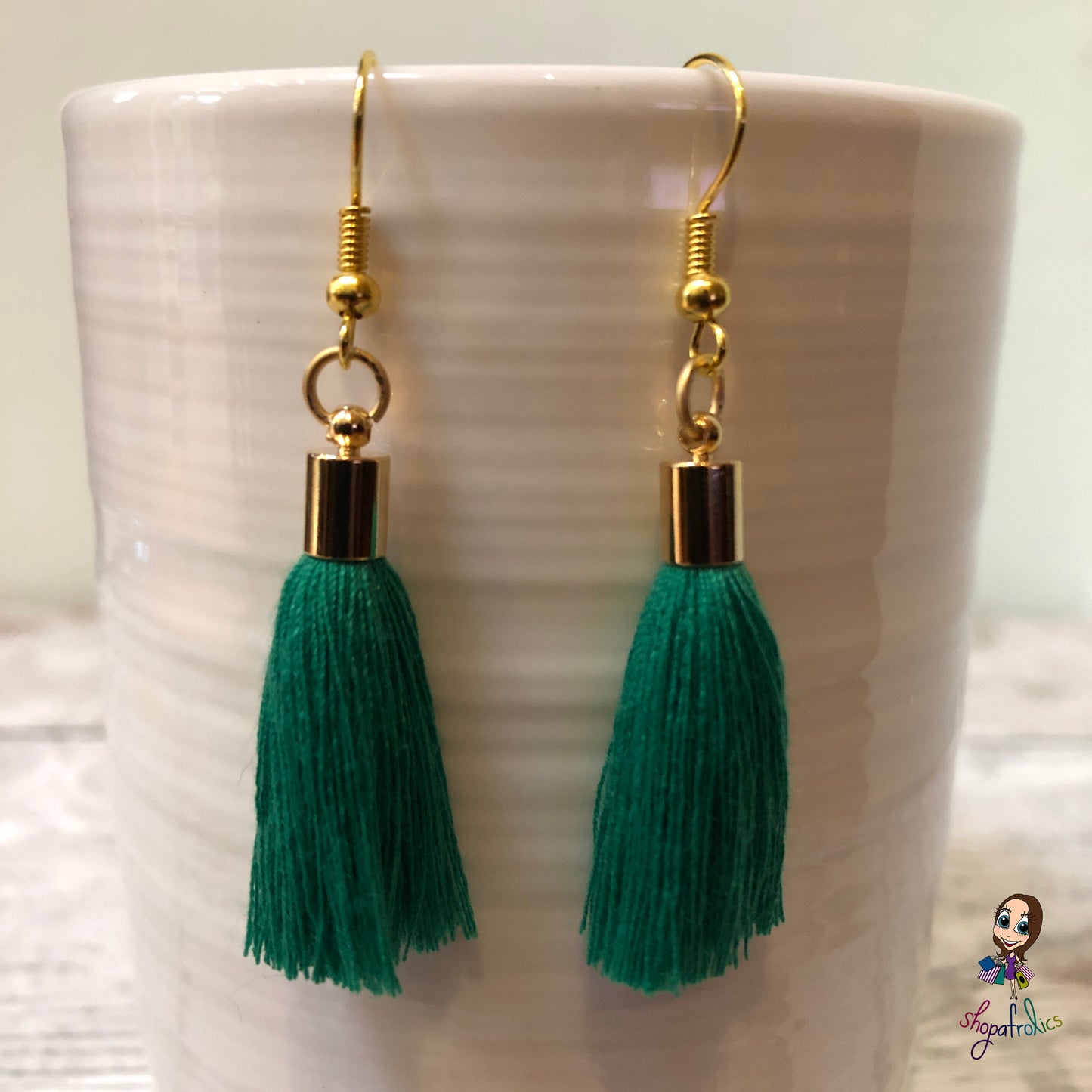 Green Cotton Tassel Earring with gold plated ear hooks, and findings.