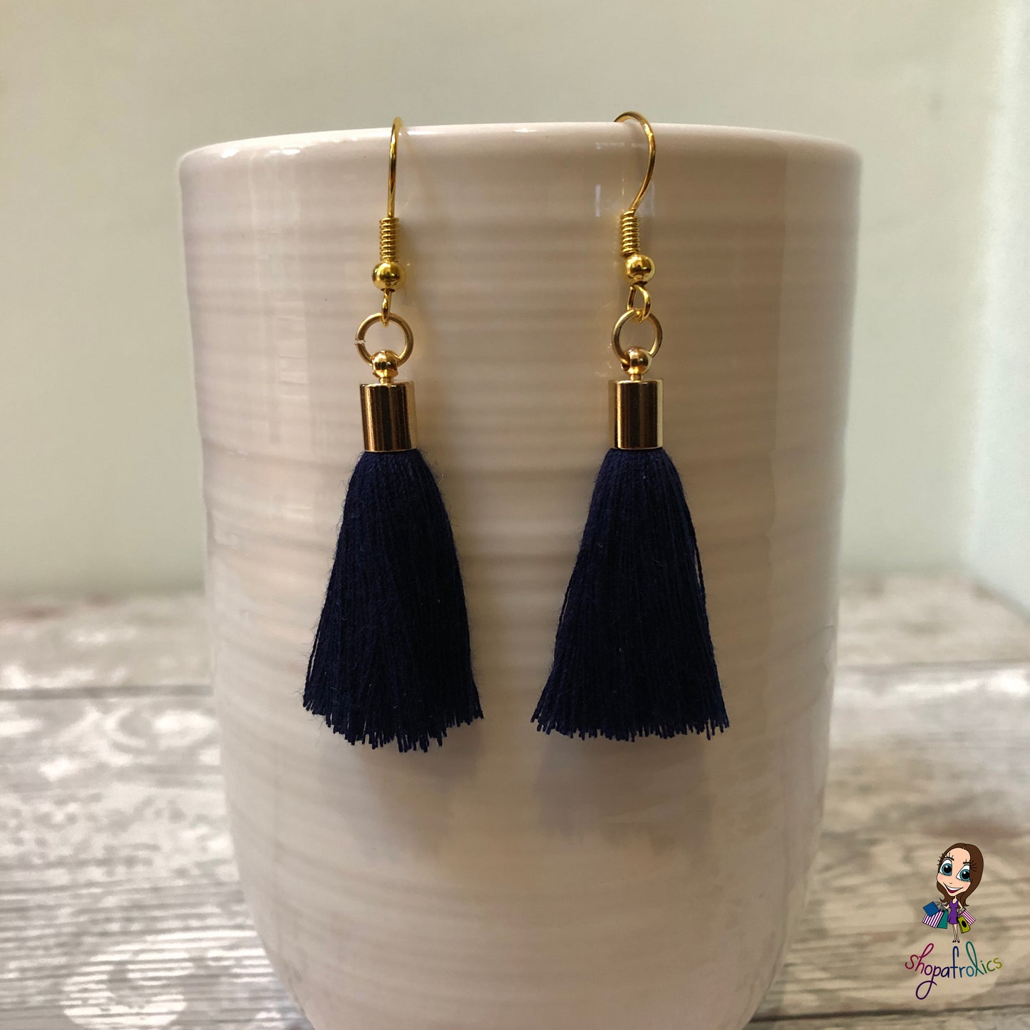 Navy Cotton Tassel Earring with gold plated ear hooks, and findings.