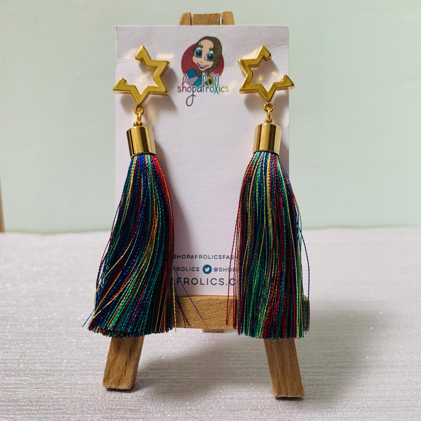 Long rainbow tassel earrings with gold star earrings