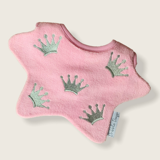 Pink bib with embroidered princess crowns