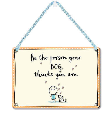 Tin sign with a dog design Includes slogan: Be the person your dog thinks you are