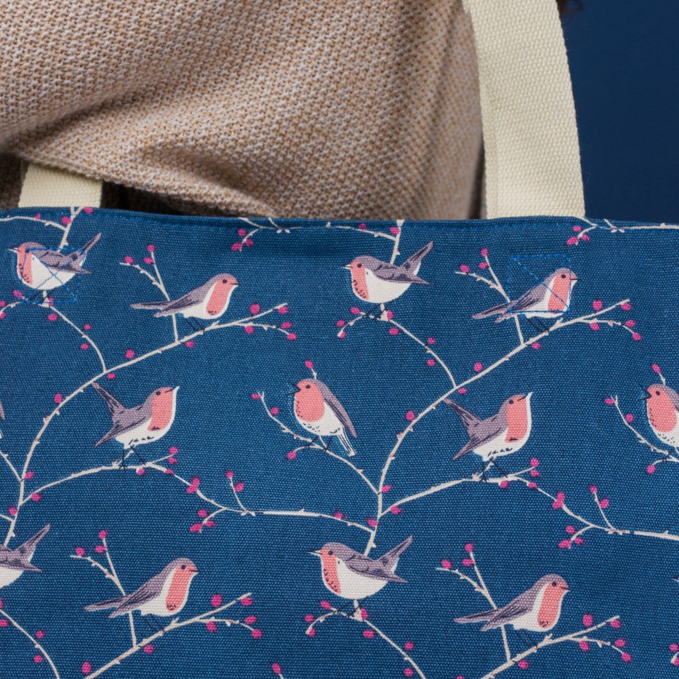 Red Robin on a branch design print, on a dark blue background.