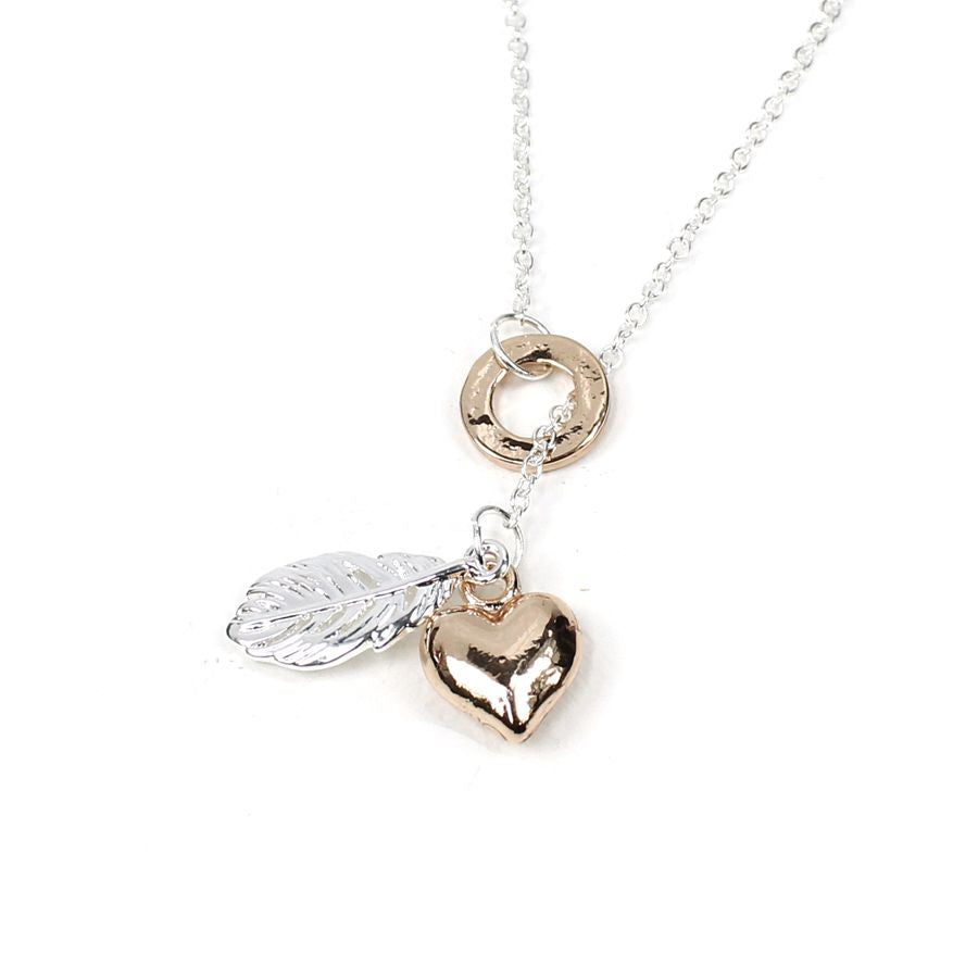 Silver plated split chain necklace with a silver plated feather and rose gold style heart threaded through a hammered disc with a rose gold finish