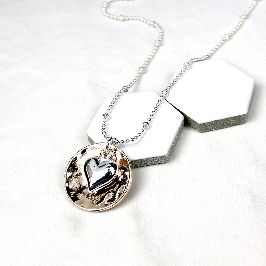 Decorative silver plated fine chain necklace with rose gold plated beaten concave disc and silver plated puff heart