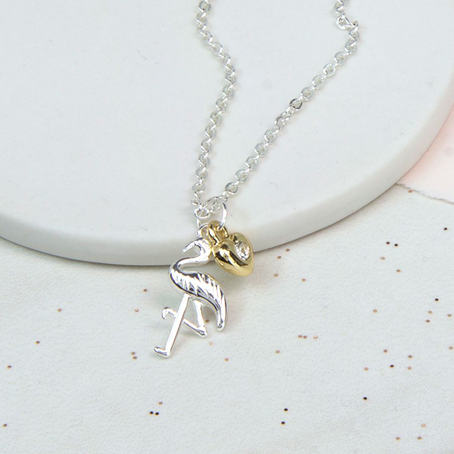 Fine chain silver plated necklace with a gold silver crystal heart and a silver plated flamingo charm.