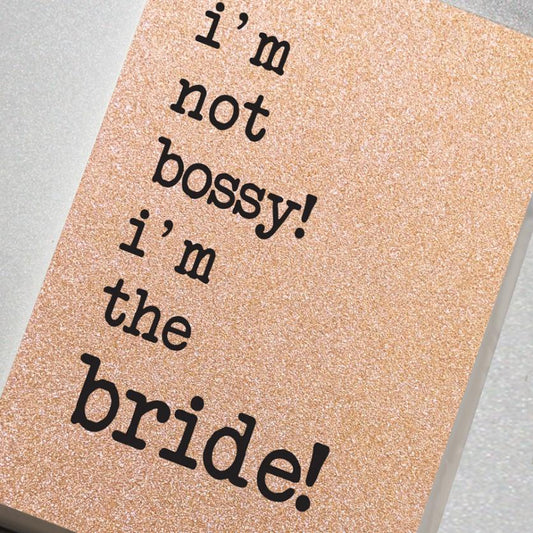 A fabulously sparkling rose gold glitter effect covered notebook featuring in the slogan: I'm Not Bossy! I'm the Bride!