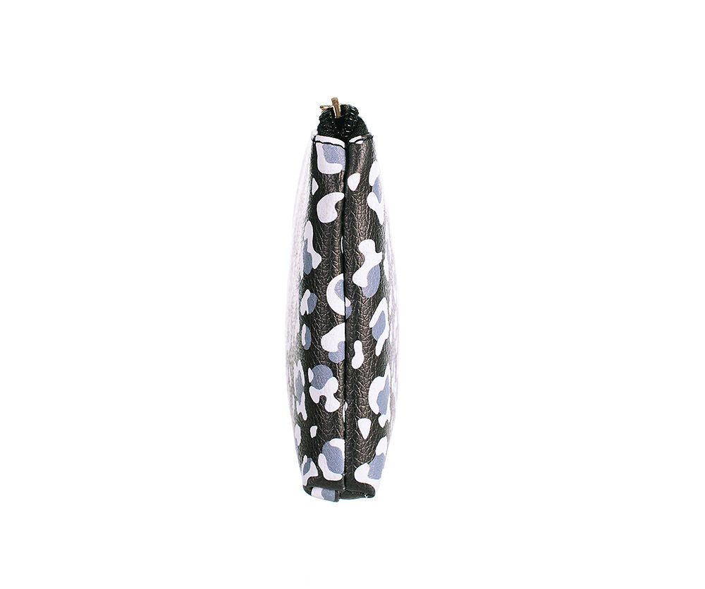 Side profile of mono leopard make up bag