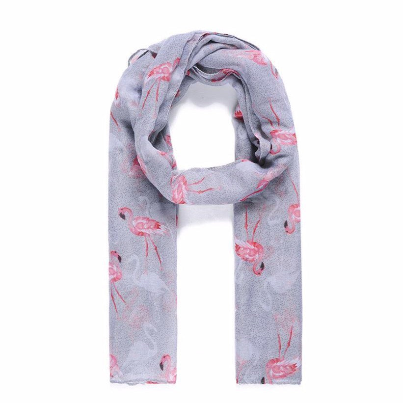 A lightweight grey scarf printed with a fabulous pink flamingo design by Catherine Lansfield.