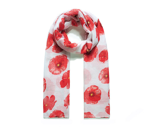 A beautiful white scarf printed with a vibrant red poppy design.