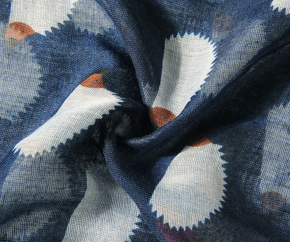 Close up of navy hedgehog scarf