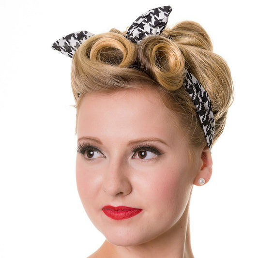 Girl modelling black and white houndstooth vintage style headband