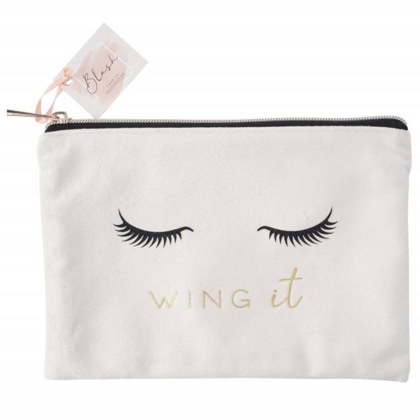 Pretty eye lash design make up bag featuring the phrase Wing It