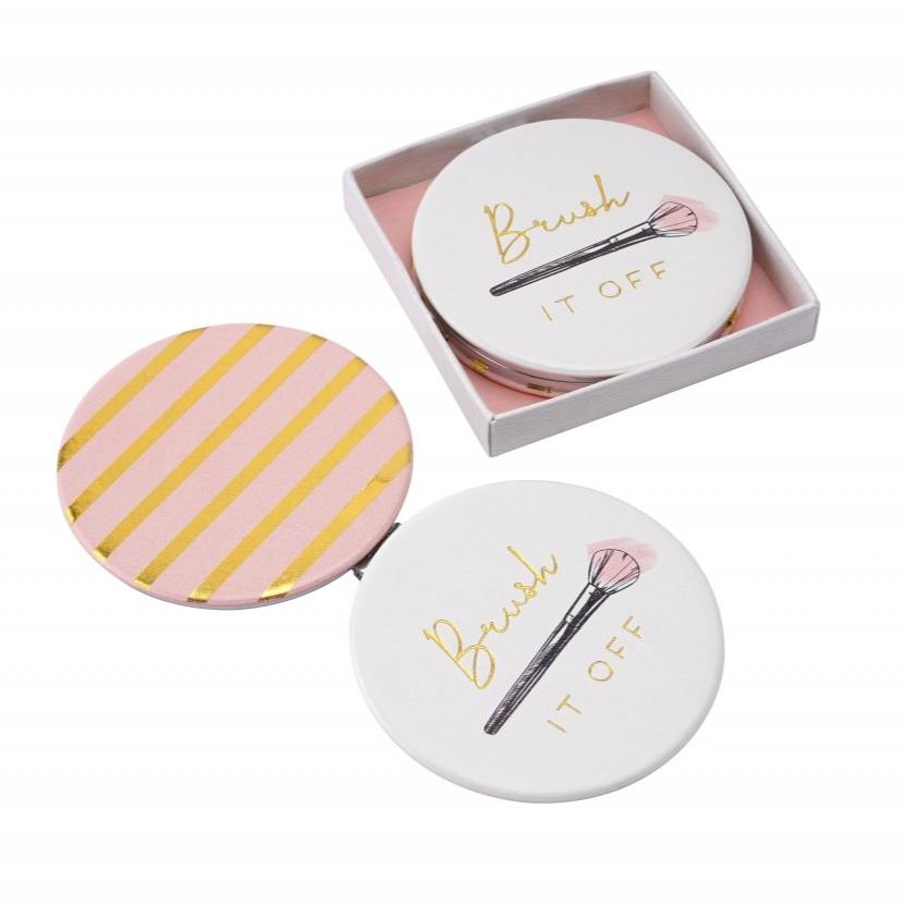 Brush it off pretty compact mirror, with make up brush detail and gold and pink striped reverse.