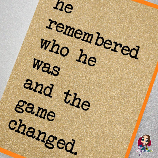 A fabulously sparkly gold glitter effect greeting card featuring the slogan: He remembered who he was and the game changed.