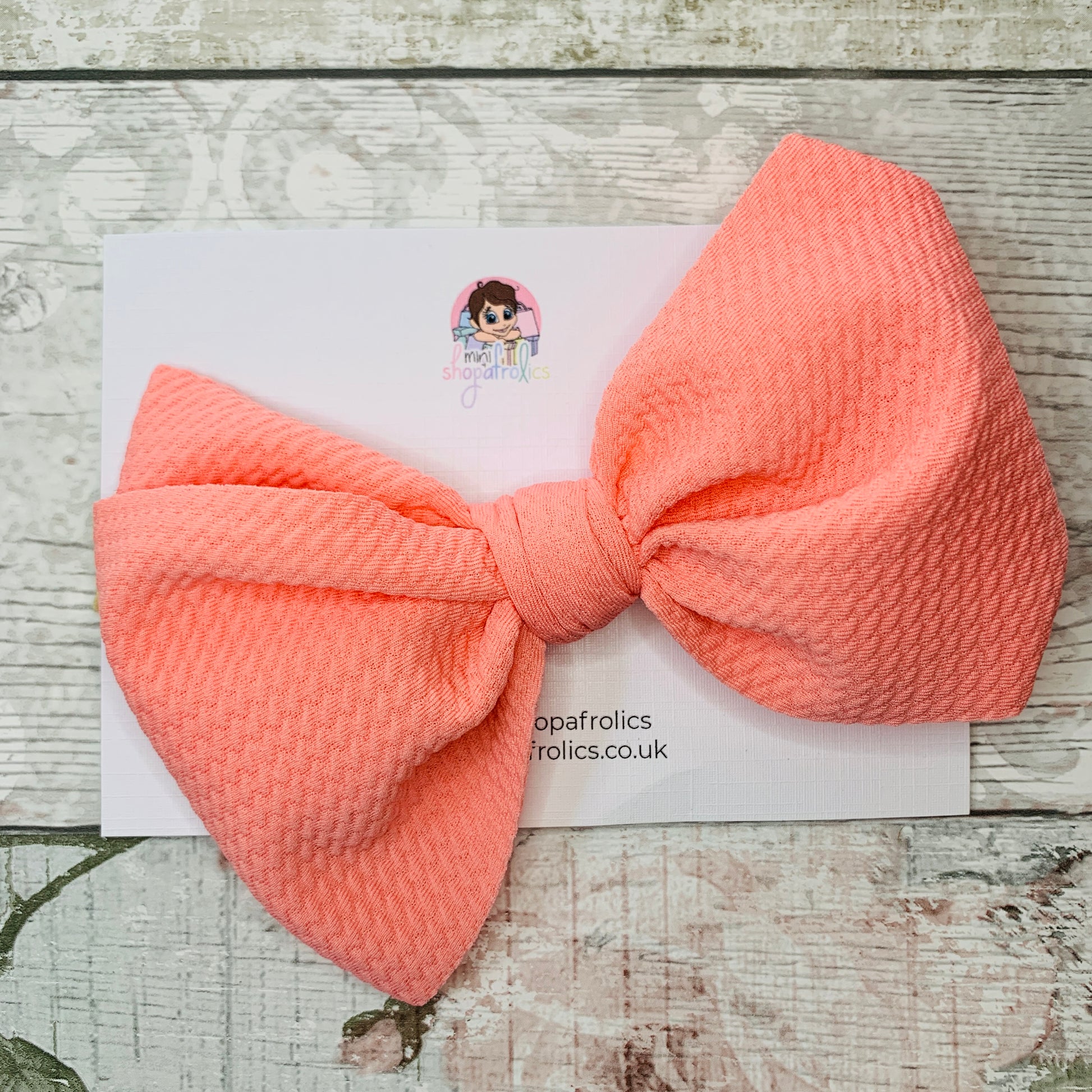 Salmon pink waffle bow baby headband