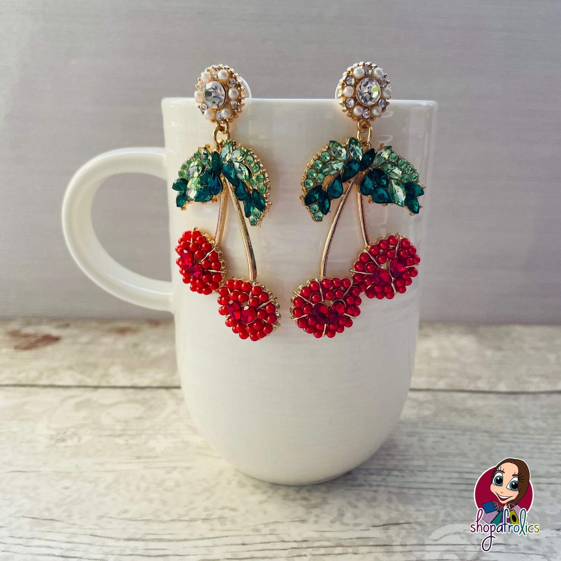 Large cherry crystal earrings with embellishments