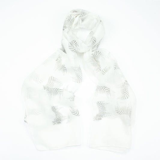 Fun light grey zebra design on a white background printed scarf. 