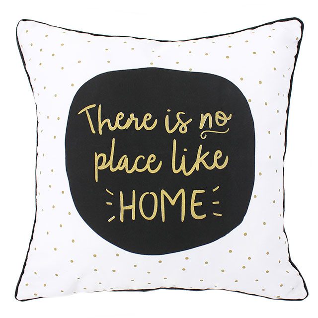 Black, white and gold cushion featuring phrase There Is No Place Like Home