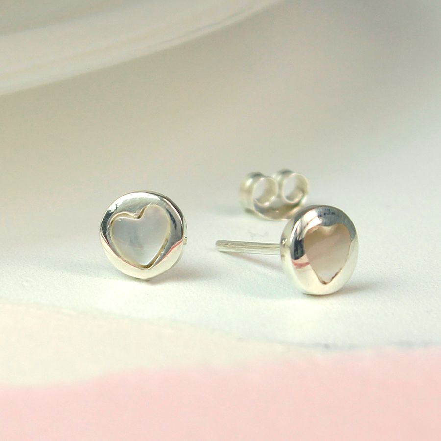 Round sterling silver ear studs with pearl heart insert
