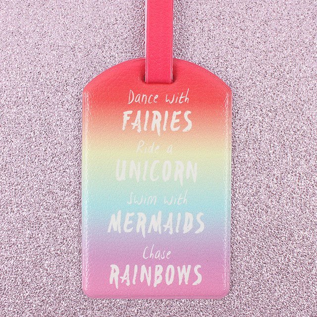 Brightly coloured rainbow luggage tag with slogan Dance with Fairies, Ride a Unicorn, Swim with Mermaids and Chase Rainbows