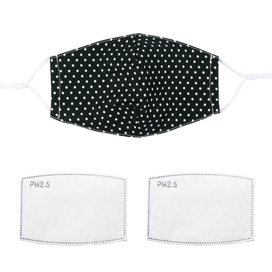 Fashionable face mask with a black and white polka dot printed fabric design.