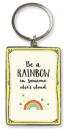 Metal keyring with a rainbow design and featuring the words Be a Rainbow in Someone Else's Cloud