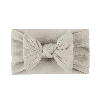 Light grey baby bow headband in cable knit soft stretch material