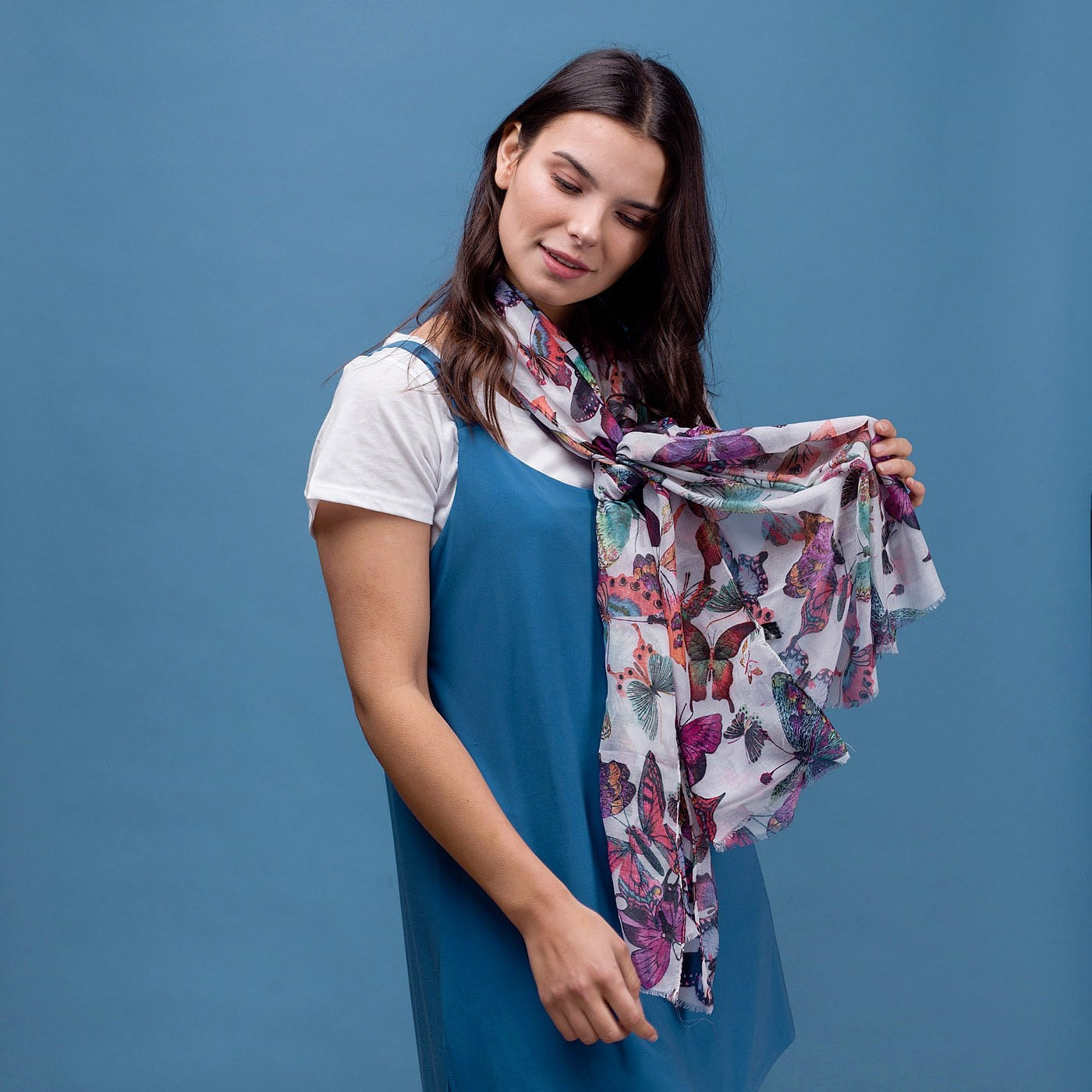 Delicate butterfly print scarf in white with rolled edge.
